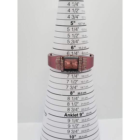 Women\'s watch. Rose pink bangle band with jewels on face. F334565-1/LS